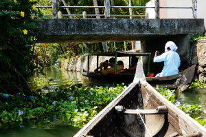 Canoeing through narrow canals